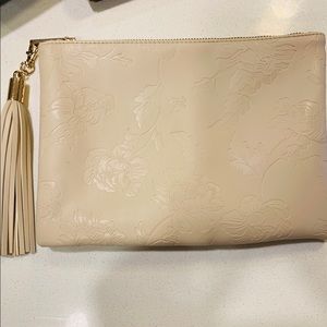 Nude clutch bag